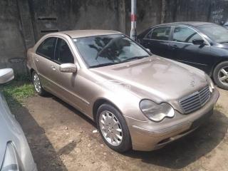 2005 Mercedes Benz E Class Gold